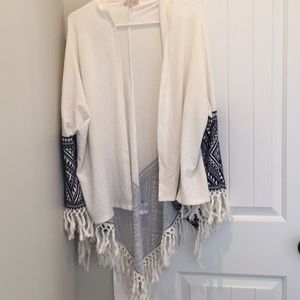 Cream and navy poncho